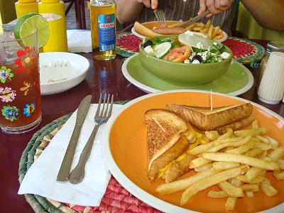 american food toast, frech fries and greek salad